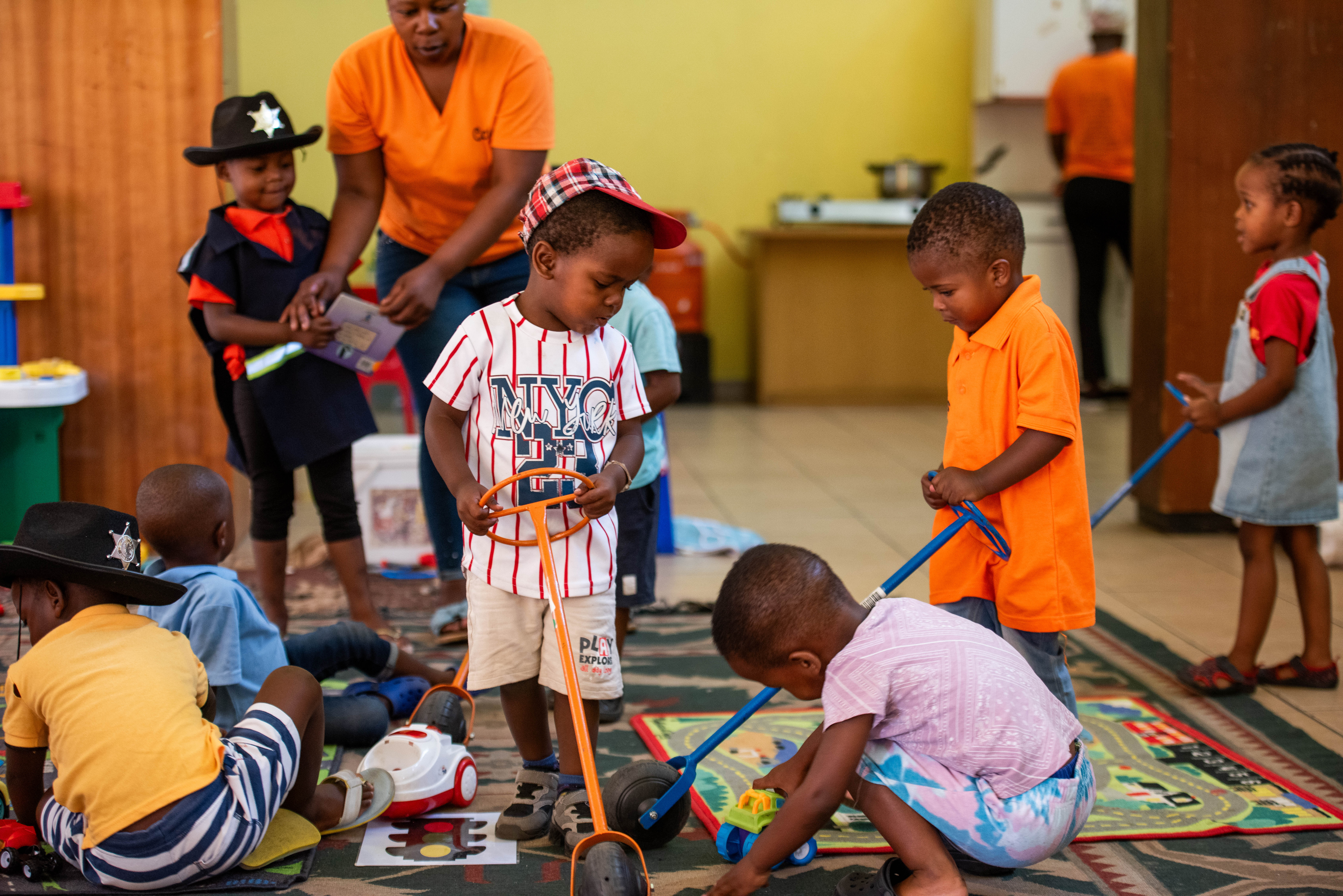 Khumo playing with toys